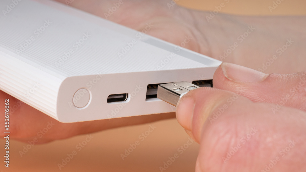 connecting usb phone to power bank, portable accumulator for charging smartphone. connecting usb phone to power bank, portable accumulator for charging smartphone.