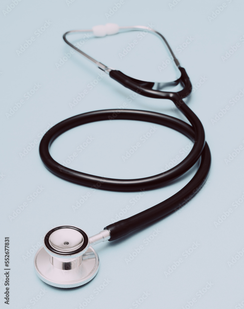 Medical pediatric stethoscope on light blue Medical pediatric stethoscope on light blue