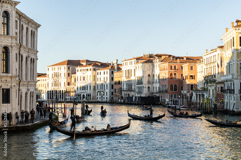 A view of the grand canal in Venice, Italy before sunset.