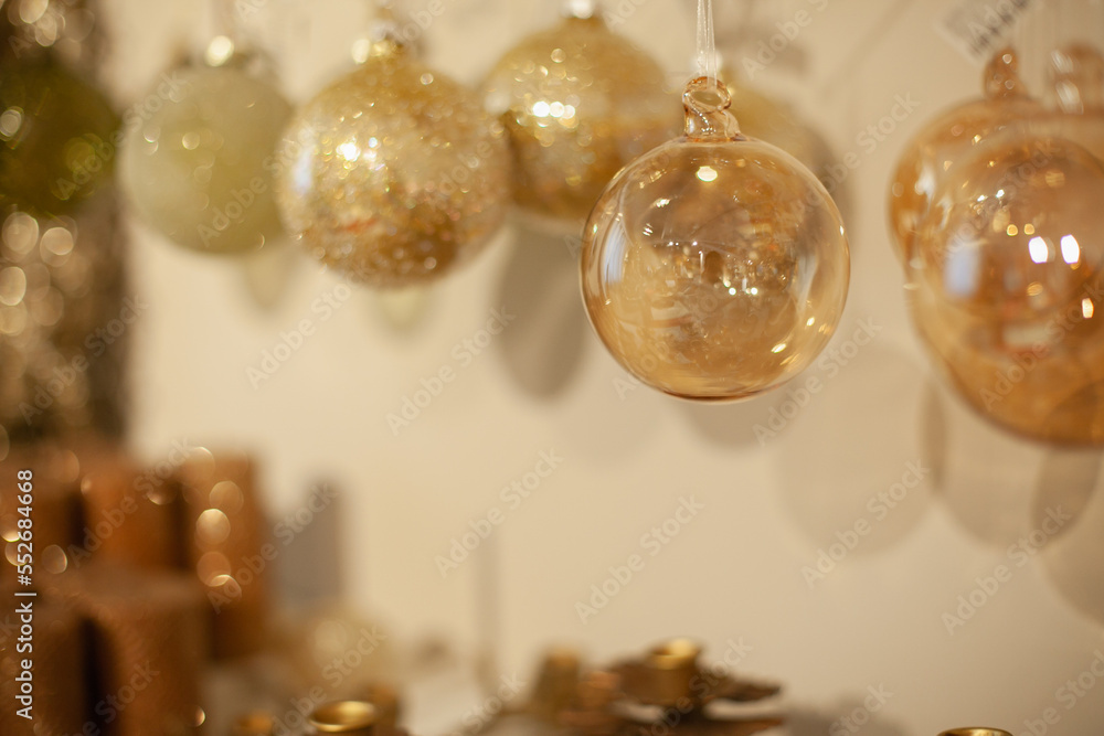 Golden Christmas balls festive decoration at store or shop 