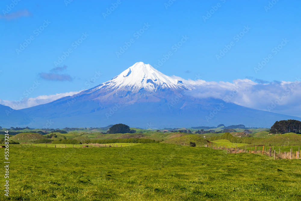 Snow capped Mount Taranaki rural view, New Zealand Snow capped Mount Taranaki rural view, New Zealand