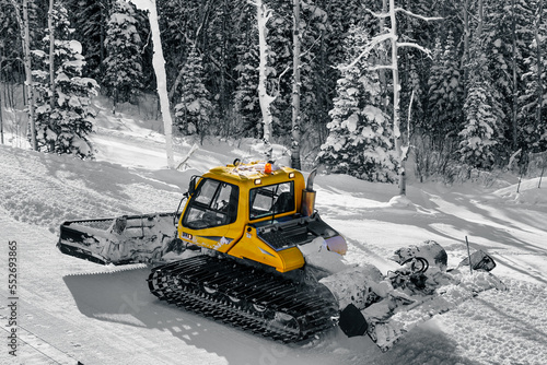 Snow Cat  groomer on mountain with black and white background