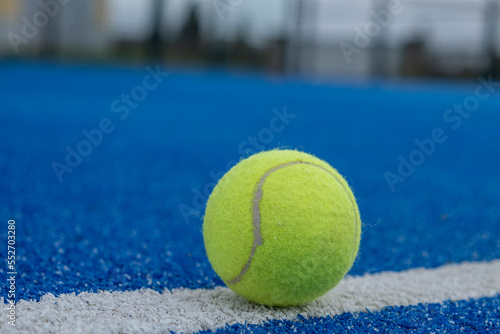 blue paddle tennis court and one ball © Vic
