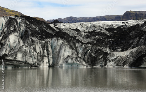 Wallpaper Mural A group of tourist on top of the Sólheimajökull Glacier located in southwestern Iceland.  Shot in August 2022. Torontodigital.ca
