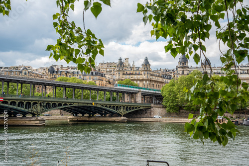 A metro crossing the bridge Bir Hakeim over the Seine in Paris photo