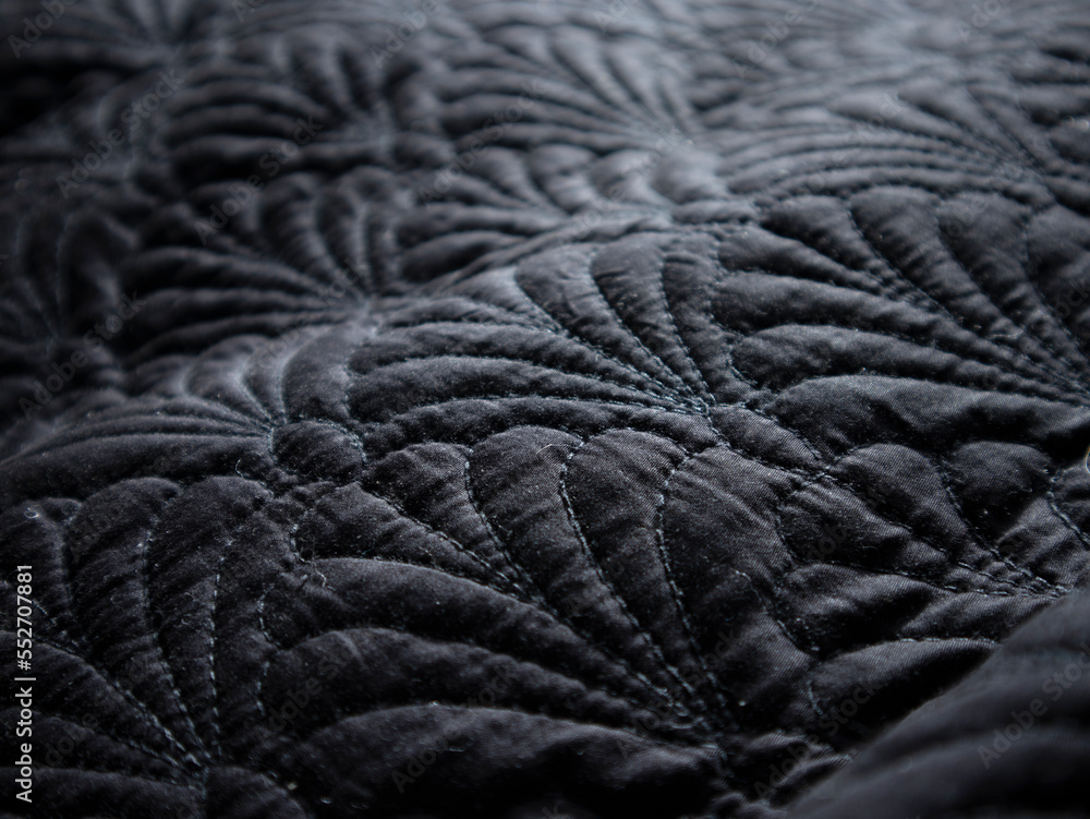 Close up of beautiful wrinkle black fabric texture. Smooth elegant black cotton or wool texture can be use as abstract background. Luxurious background design Close up of beautiful wrinkle black fabric texture. Smooth elegant black cotton or wool texture can be use as abstract background. Luxurious background design