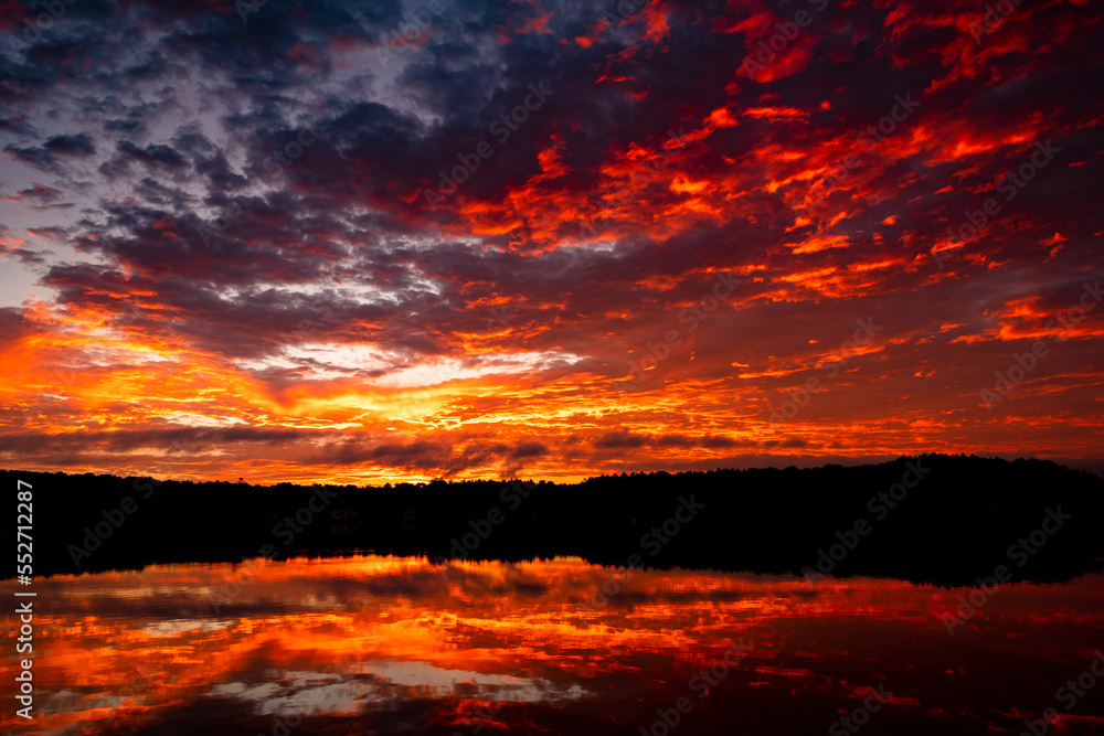 beautiful sunrise reflection over lake