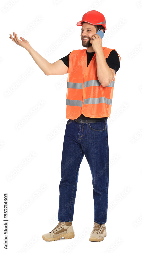 Man in reflective uniform talking on smartphone against white background Man in reflective uniform talking on smartphone against white background