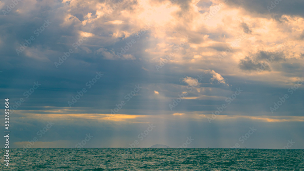 The sky is reflected by the sunlight hitting the sea The sky is reflected by the sunlight hitting the sea