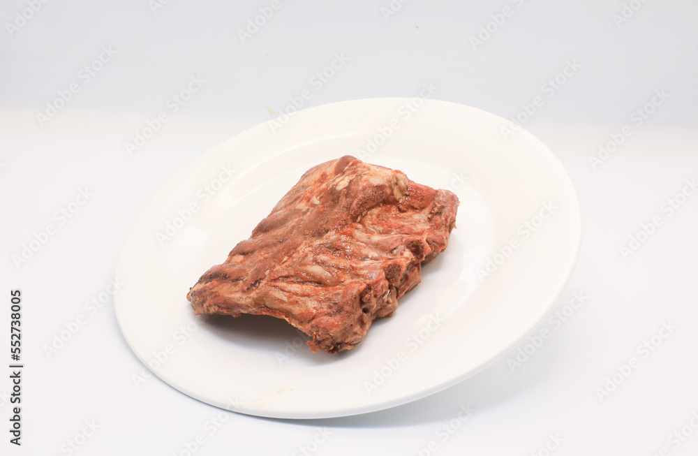 Fried pork ribs, barbecue, put in a white plate