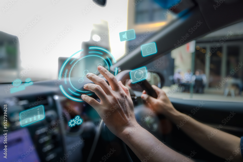 futuristic vehicle and graphical user interface(GUI). intelligent car. connected car. Internet of Things. Heads up display(HUD).