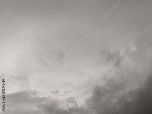 View of overcast sky. Dramatic gray sky and white clouds before rain in rainy season. Cloudy and moody sky. Storm sky. Cloudscape. Gloomy and moody background.
