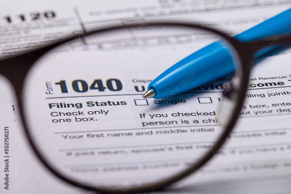 Income tax with instruction. Tax payment and filing concept Income tax with instruction. Tax payment and filing concept