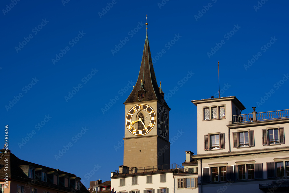 Church tower with largest church clock face in Europe of medieval church St. Peter at the old town of Zürich on a sunny late summer day. Photo taken September 22nd, 2022, Zurich, Switzerland. Church tower with largest church clock face in Europe of medieval church St. Peter at the old town of Zürich on a sunny late summer day. Photo taken September 22nd, 2022, Zurich, Switzerland.