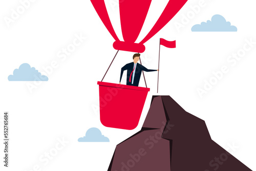 Most efficiency way to reach business goal, smart businessman flying balloon reaching mountain peak to grab success flag.