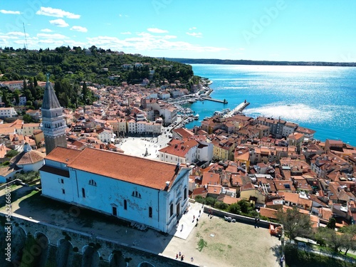 Cerkev sv. Stefana, Piran church Piran Slovenia on sunny day drone aerial view photo