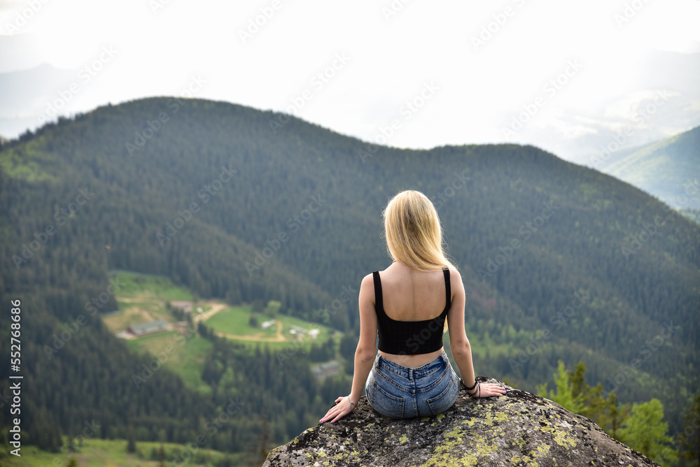 woman traveler with and looking at amazing mountains and forest, wanderlust travel concept, space for text, atmospheric epic moment
woman traveler with and looking at amazing mountains and forest, wanderlust travel concept, space for text, atmospheric epic moment