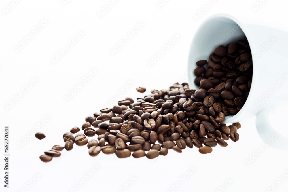 Coffee beans in cup isolated on white background Coffee beans in cup isolated on white background