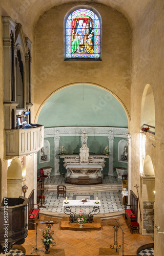 Main nave and presbytery of Our Lady of Nativity Cathedral Notre Dame de la Nativite at Place Clemenceau square in historic old town of medieval resort of Vence in France photo