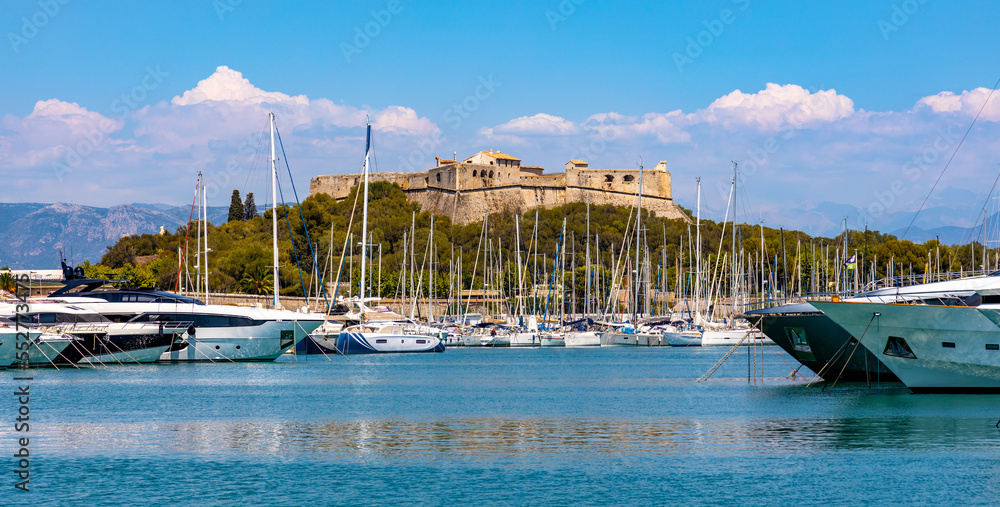 Panoramic view of harbor, port and yacht marina and Fort Carre castle offshore Azure Cost of Mediterranean Sea in Antibes resort town in France