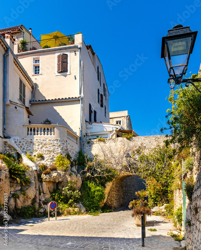 Medieval stone defense tower house at Rue Barque en Cannes street in historic old town of Antibes resort city onshore Azure Cost of Mediterranean Sea in France photo