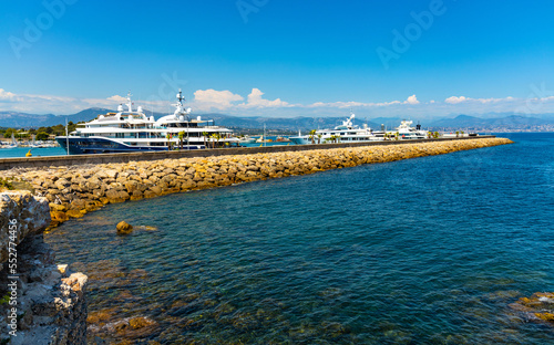Panoramic view of Vauban port with exclusive yachts docked at marina piers onshore Azure Cost of Mediterranean Sea in Antibes resort town in France