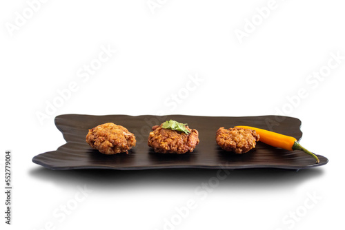 Fried Pork Balls with Garlic on black plate