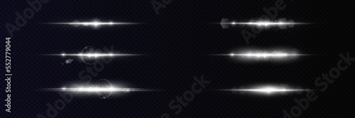 White glowing light explodes on a black background. Sparkling magical dust particles.  Transparent shining sun, bright flash. Vector sparkles. To center a bright flash.