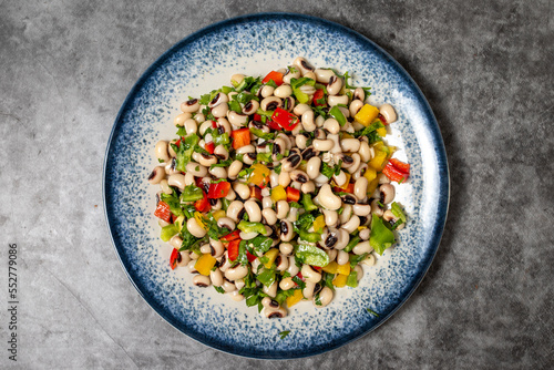 Dried cowpea salad on a dark background. Turkish cuisine appetizer flavors. Top view. close up