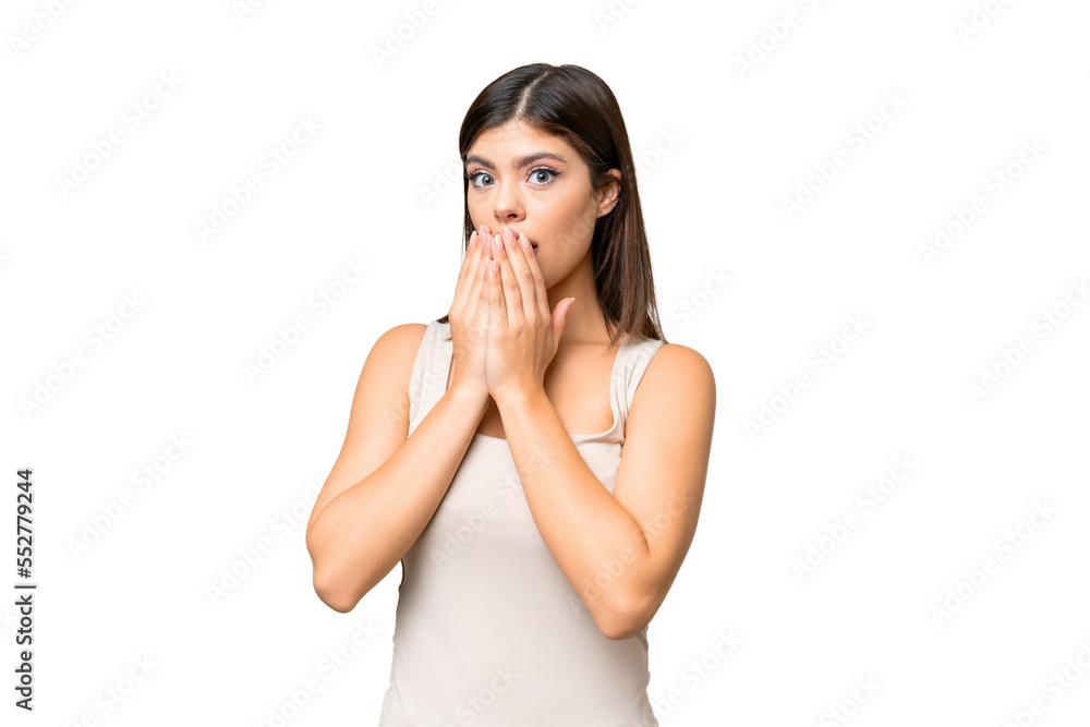 Young Russian woman over isolated chroma key background covering mouth with hands Young Russian woman over isolated chroma key background covering mouth with hands