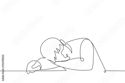 man lies on a table using his hand as a pillow - one line drawing vector. the concept of being tired and falling asleep sitting at the table
