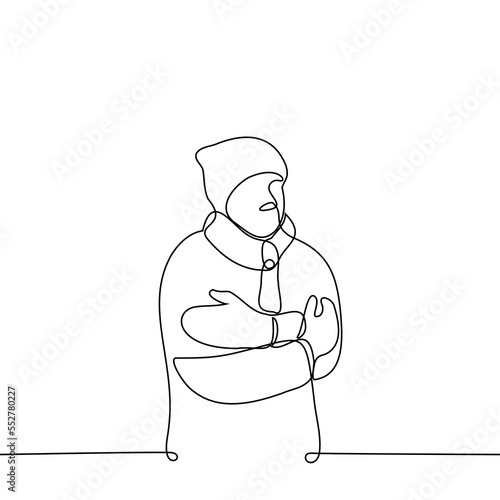 man hugging himself warming himself he is warmly dressed in a hat, scarf, mittens and an inflated jacket - one line drawing vector. concept cold winter, permafrost