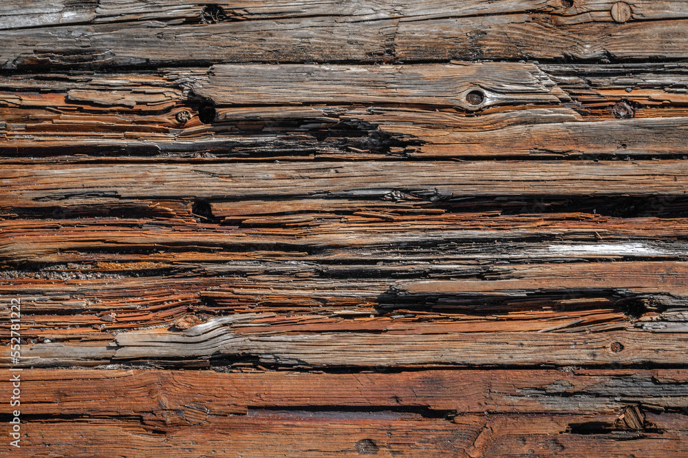 Textured surface of rough wood full of crevices. Textured surface of rough wood full of crevices.