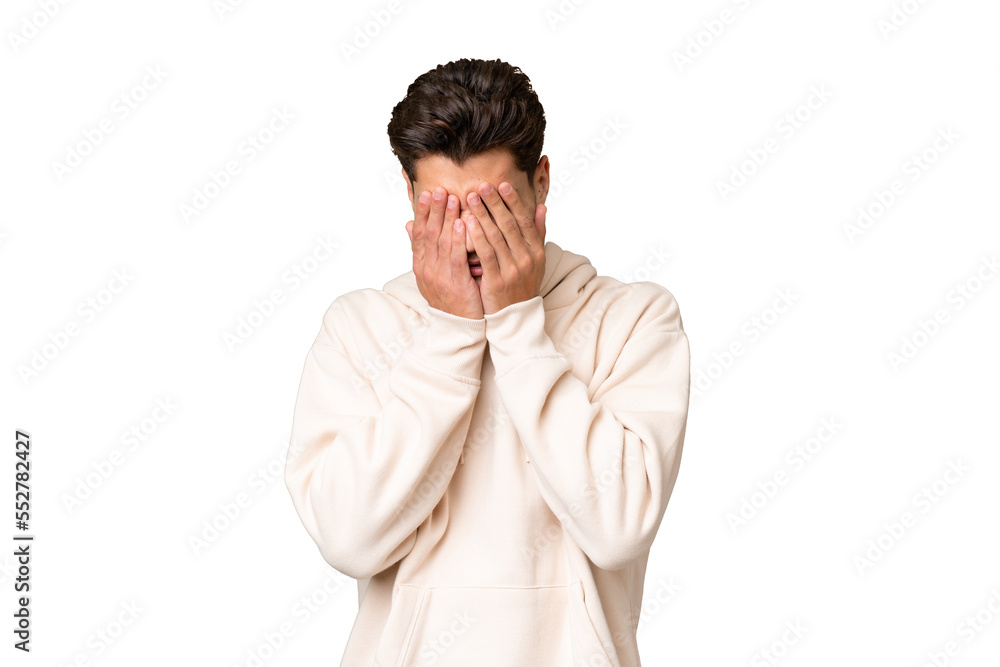 Young caucasian handsome man over isolated background with tired and sick expression Young caucasian handsome man over isolated background with tired and sick expression