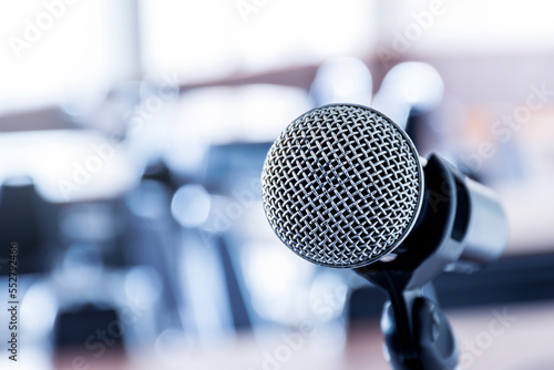 Close up microphone with tripod on stage in seminar room. photo