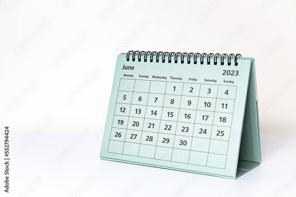 June 2023 calendar on white table. Month page June 2023 calendar on white table. Month page