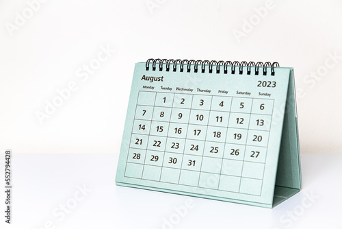 August 2023 calendar on white table. Month page