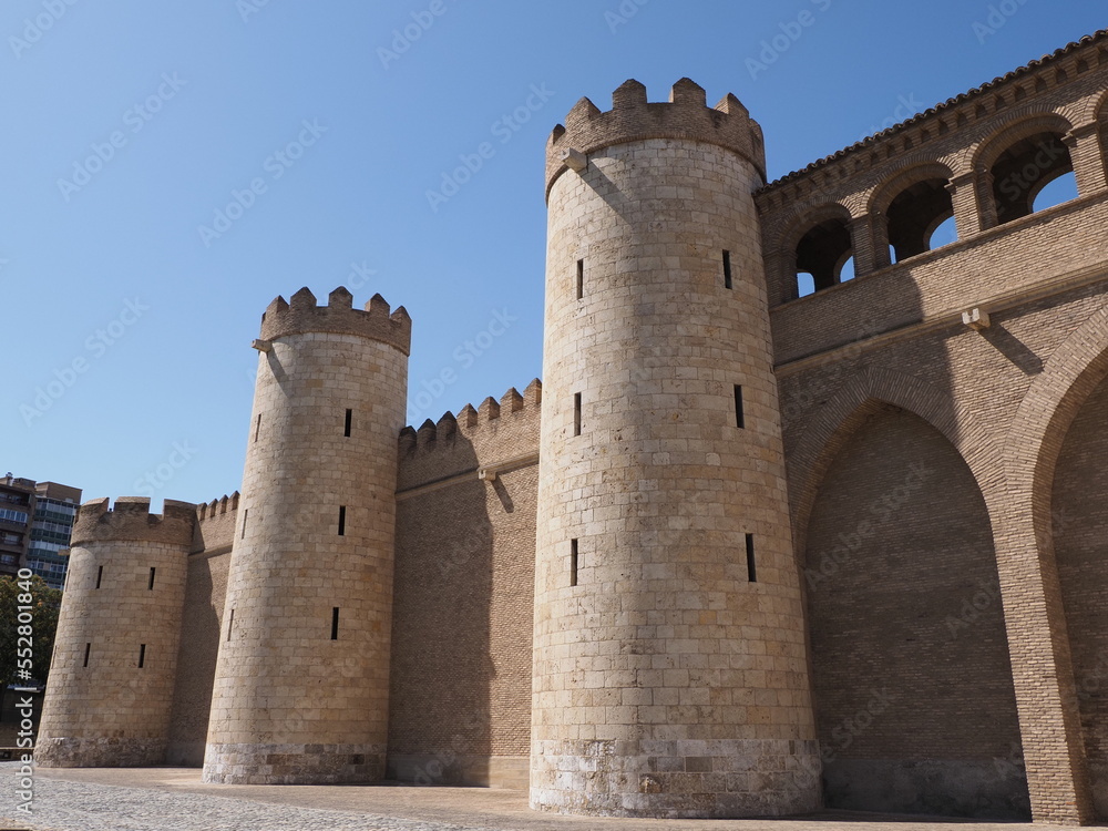 Monumental towers of palace in european Saragossa city in Spain
