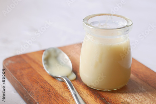 condensed milk in a bowl close up,