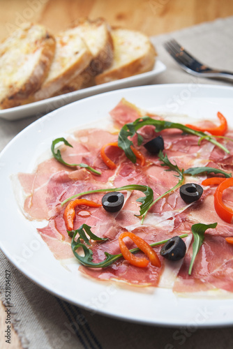 A plate of sliced ​​Spanish ham