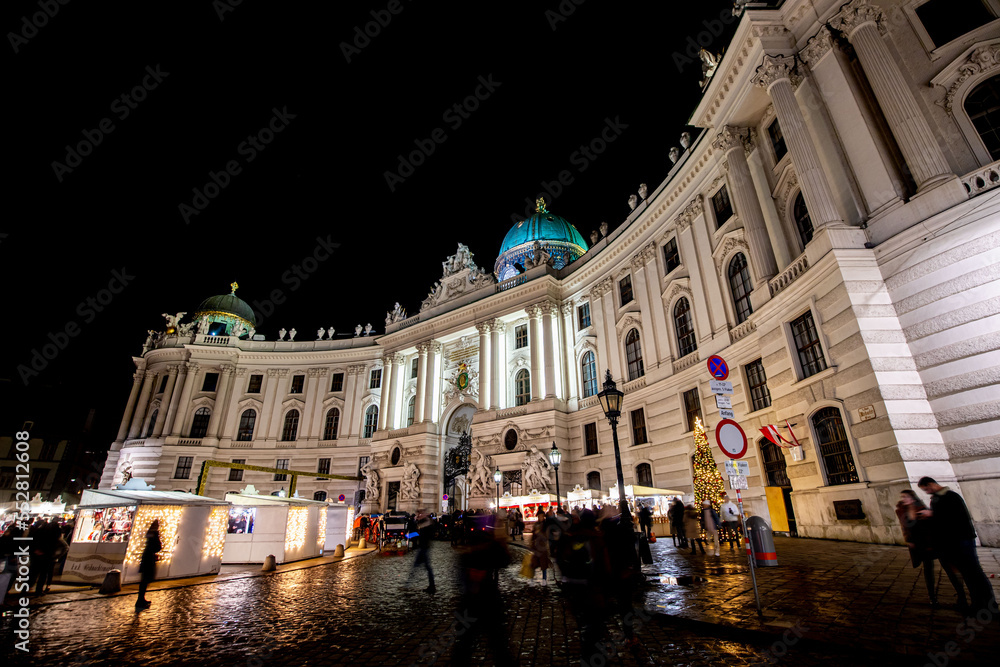 Sisi museum in Vienna at night. Michaelerplatz and its Christmas market in Vienna, Austria.