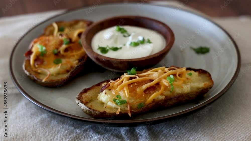 Eating Potato Skins with Sour Cream and Chives Eating Potato Skins with Sour Cream and Chives