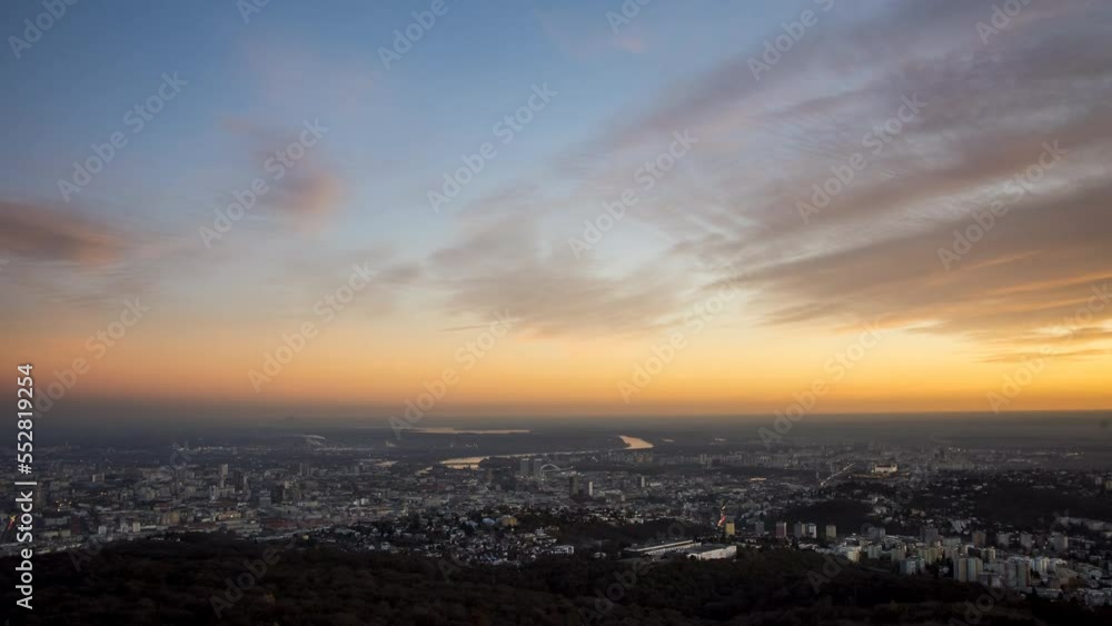 Beautiful pinkish orange sunset over Bratislava, capital city of Slovakia. Panorama view, Timelapse, 4K UHD Beautiful pinkish orange sunset over Bratislava, capital city of Slovakia. Panorama view, Timelapse, 4K UHD
