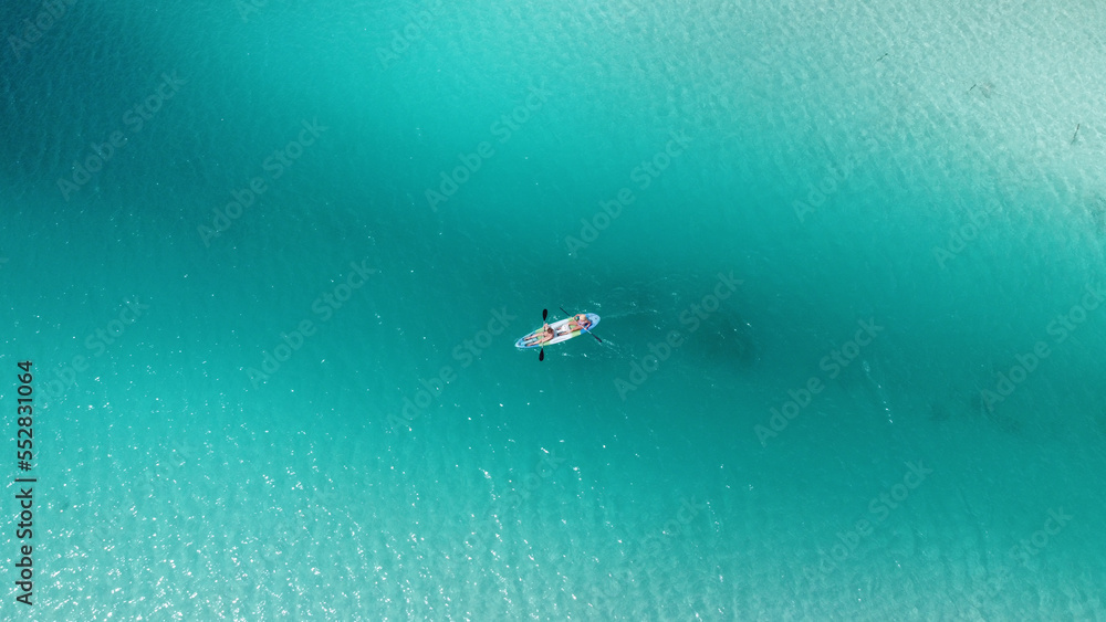 Obraz premium Aerial View Laguna Bacalar - the lake of seven colors. Laguna Bonanza The fresh water lake feed by cenotes. Near cancun, playa del carmen and tulum in mexico. Turquoise and blue water.Mangroves shores