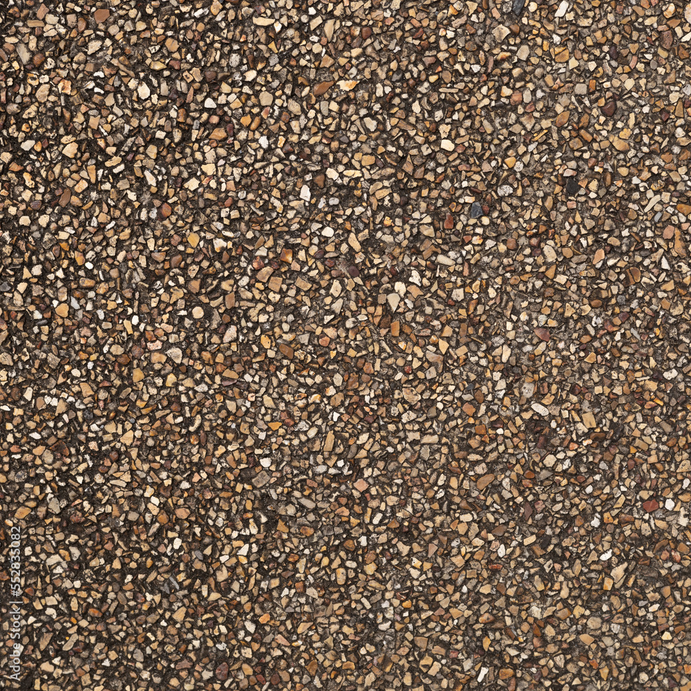 The pattern small brown pebbles stone as background. pebbles texture wall and floor. The pattern small brown pebbles stone as background. pebbles texture wall and floor.