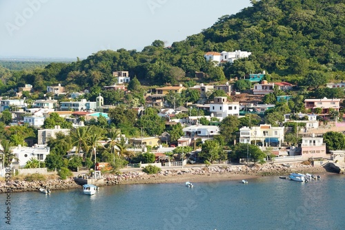 The distance view of the resorts, boats and buildings on the bay near Mazatlan, Mexico