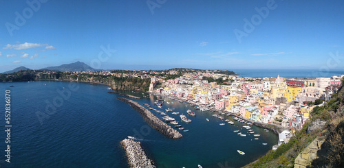 Colorful view of the Village of Marina di Corricella in the Island of Procida and view of the Island of Ischia in the rear. Campania. Italy. © JOSEANTONIO