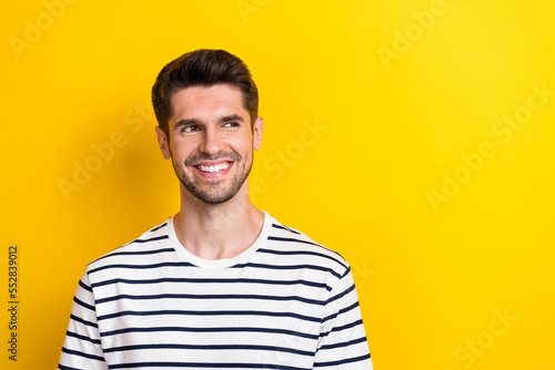 Photo of young attractive person successful student entrepreneur owner business company look mockup competitor isolated on yellow color background