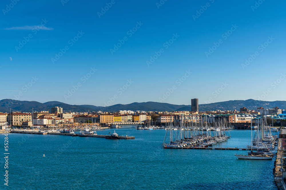 view of the sports harbor and marina and the old town center of Livorno
