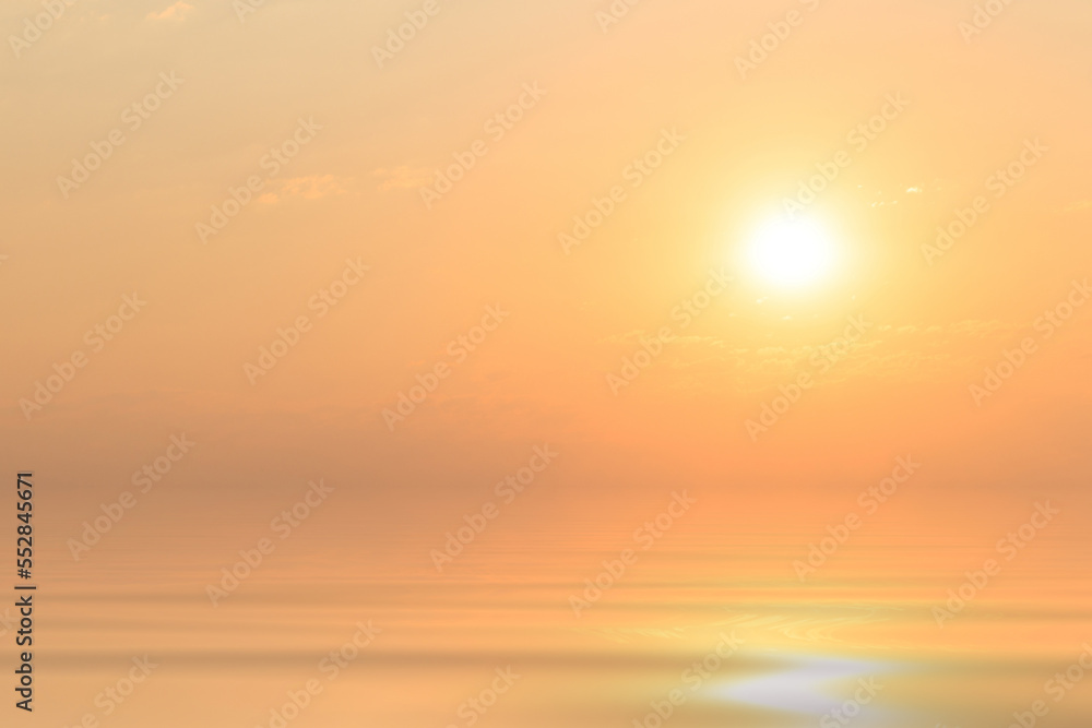 water surface at sunset with sun and clouds